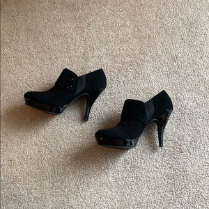 These ankle boots have never been worm